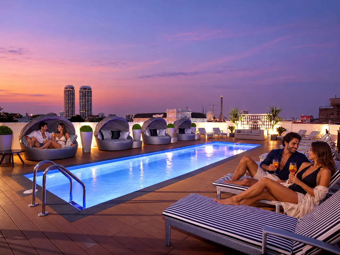 Two couples at the actual Villa De Khaosan rooftop pool