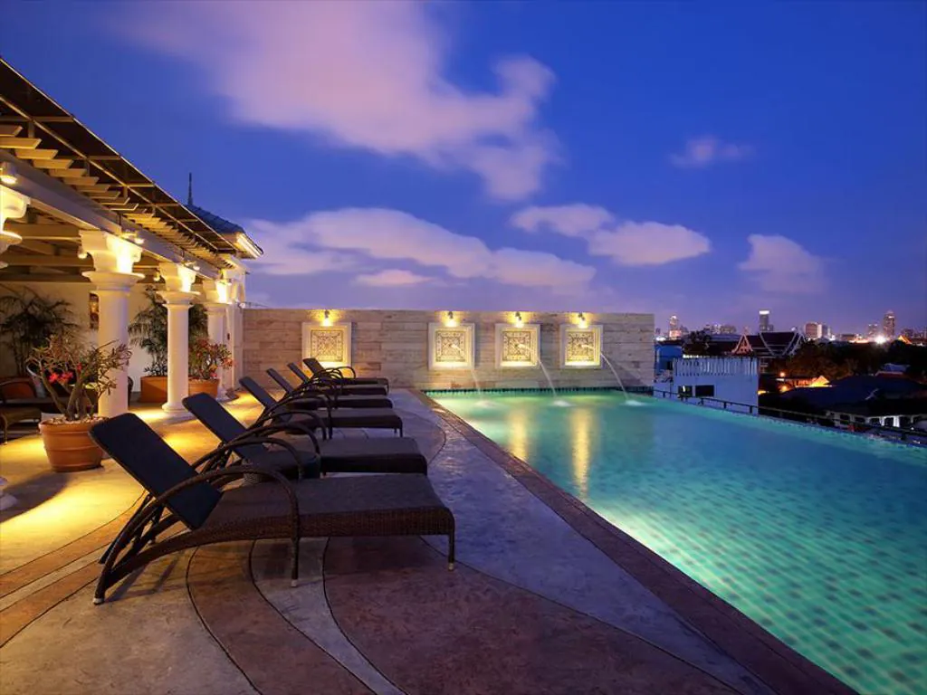 Chillax Resort rooftop swimming pool overlooking Bangkok at blue hour