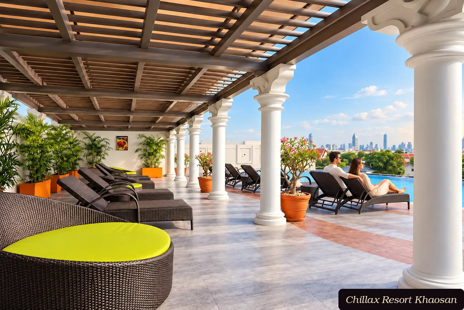 Adult couple relaxing by the Chillax Resort rooftop pool